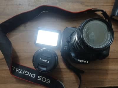 Canon 700D with rotating display  ! 2 Lens : 50mm and 18-55. .