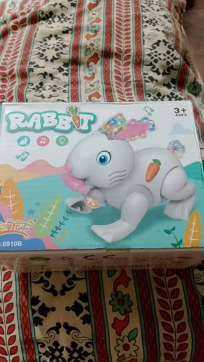 Battery operated rabbit , music and light