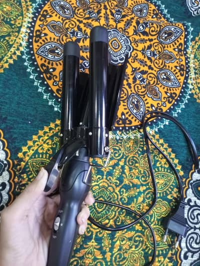 hair curluer with three barrels