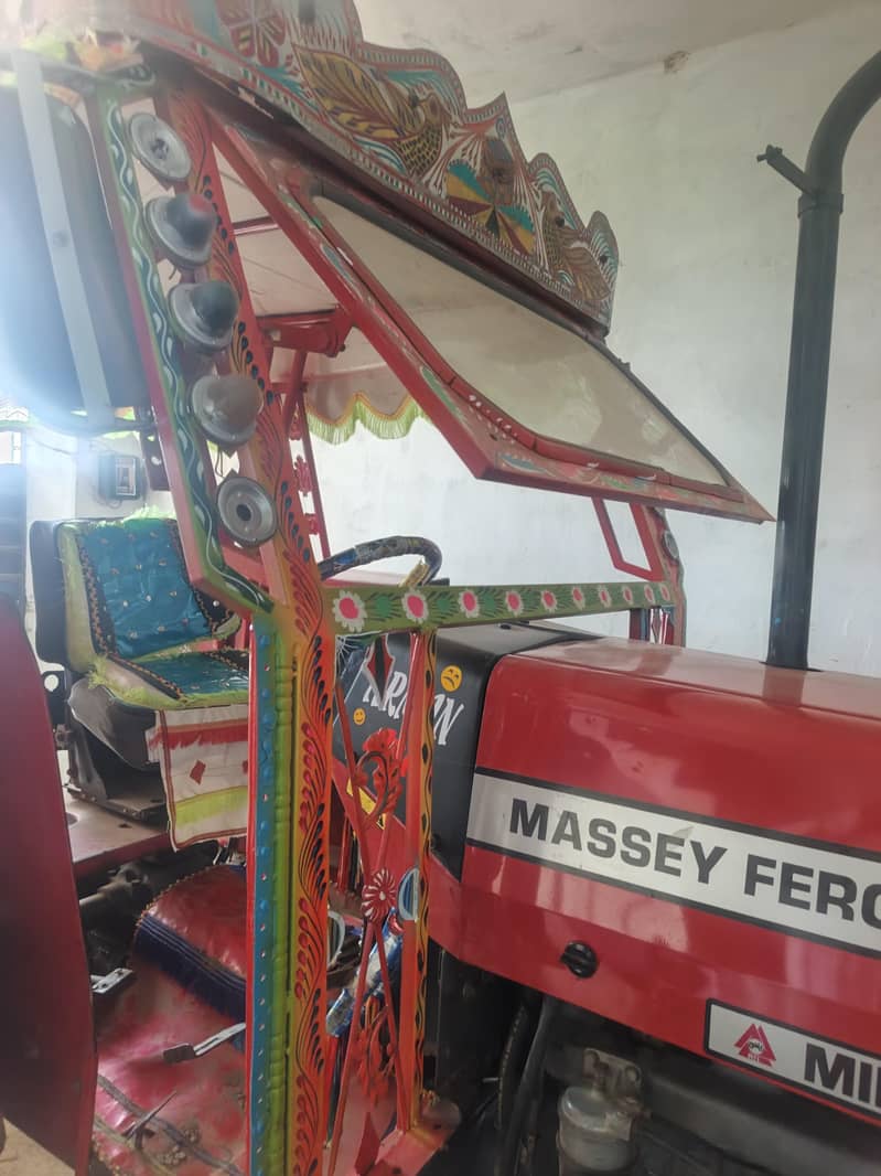MF 385 tractor 9