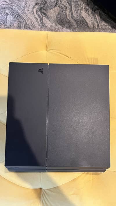 PS4 Fat edition with 2 controllers with games
