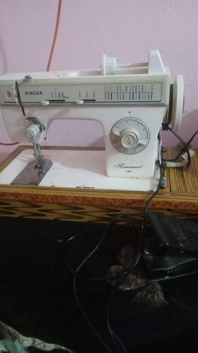 singer machine 1