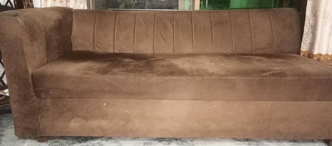 used brown L-shaped sofa in good condition