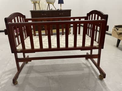 Wooden cot and baby chair of tinnese
