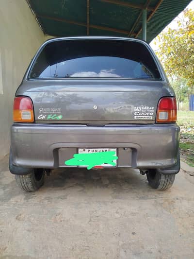 Daihatsu Coure Car 2006 Model