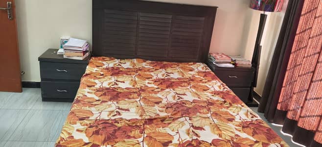 Bed without mattress and 2 side tables