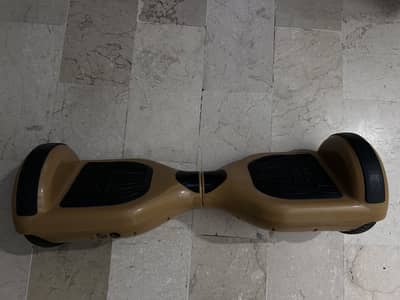Brown-goldish hoverboard-in good condition