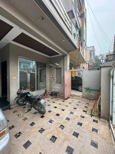 8 marla triple story house