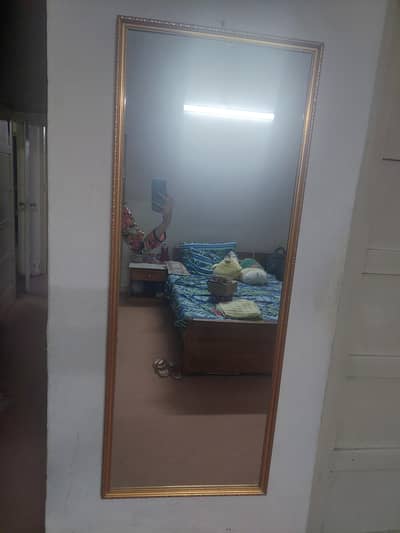 Mirror with gold border 49x19in