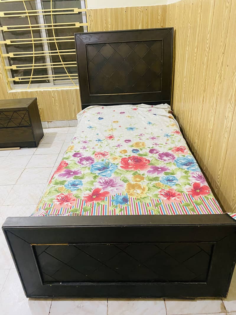 Single bed with side table 0