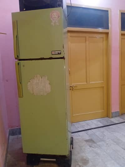 An Indesit Refrigerator is for sale