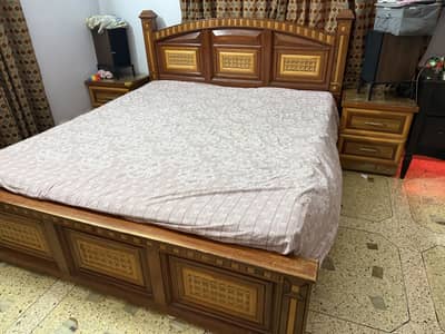 King-sized wooden bed with 2 bedside tables (used)