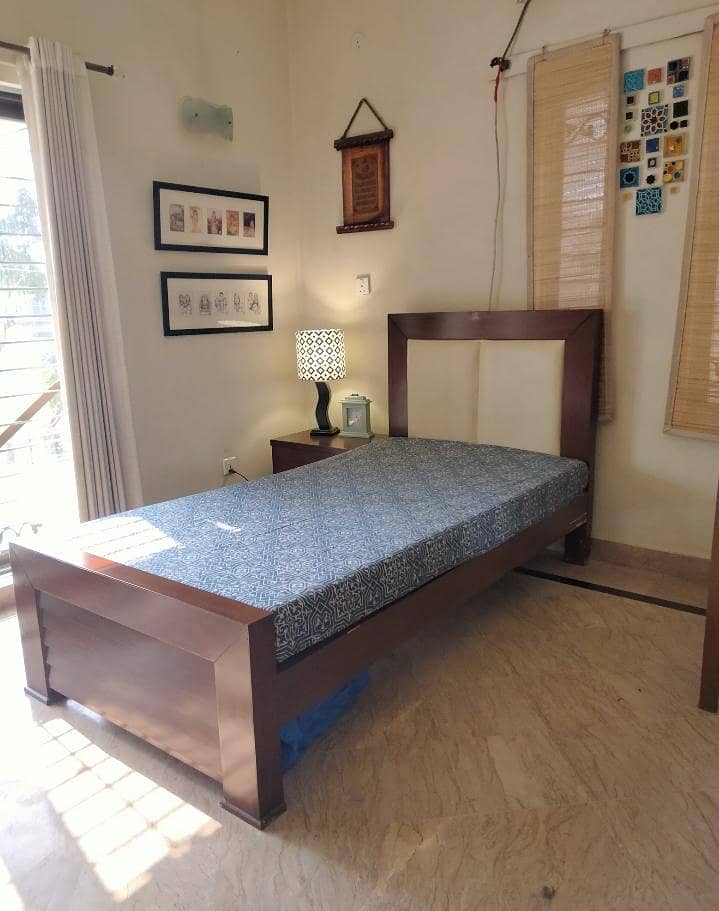 single bed with side table 0