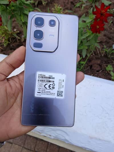 Infinix note 50 with complete box used in one hand with safe and secur