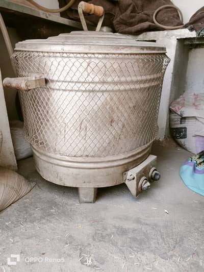 Gas tandoor four large bread make at a time. . .