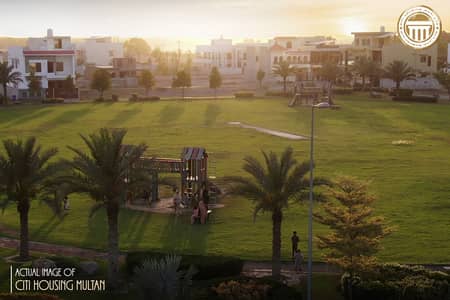 22.5 Marla Facing Park All Dues Paid Plot In Possession Area