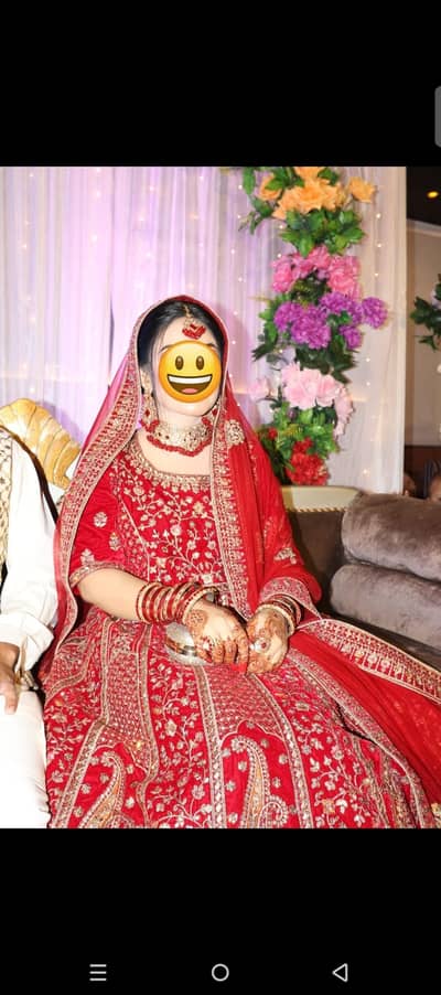 Heavy embroidered bridal dress in medium size available chest 22