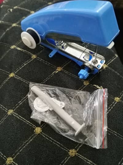 Teeny tiny sewing machine