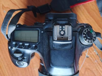 canon 80d with 18 135 lens and two bettery