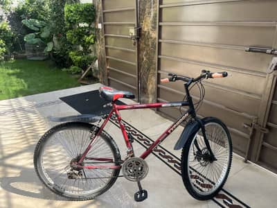 Red Cycle with gear