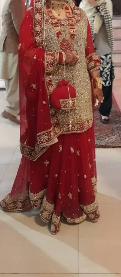 Traditional Red Bridal Lehenga – Heavy Embroidered Wedding Dress