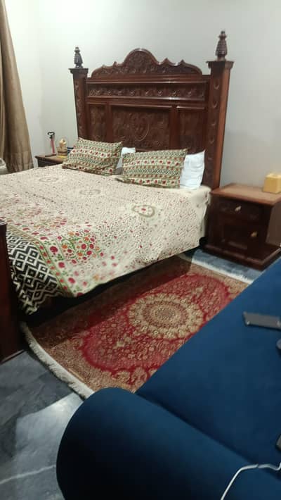 bed with two side tables