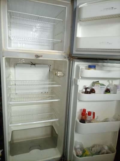 Dawlance dual door refrigerator for sale.