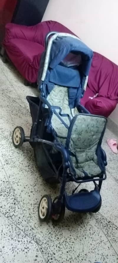 baby prams use in blue color good condition