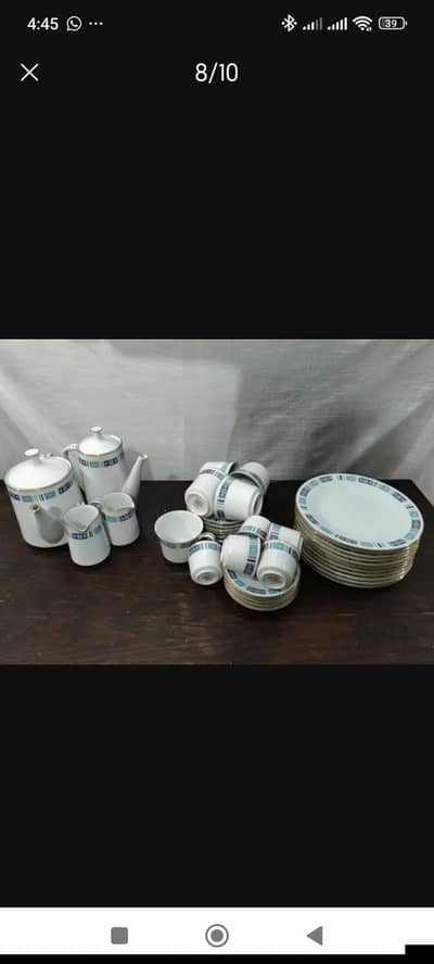 a beautiful blue and white dinner set for sale