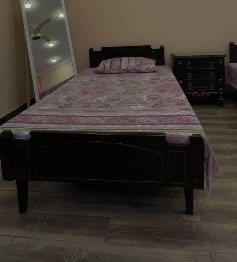 2 single beds and bedside table 3