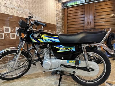 Honda 125 Black Total Geniune