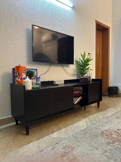 A fine black &brown console