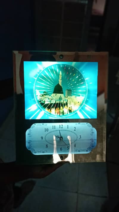 Beautiful clock with Masjid e nabvi background and lighting