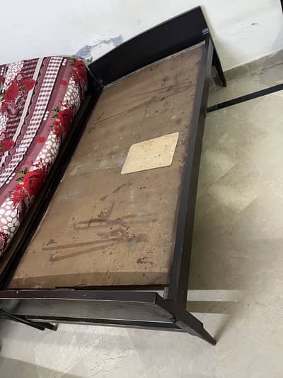 Single wooden bed