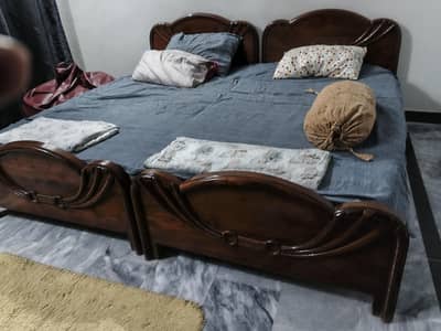 Single beds (2) with matters