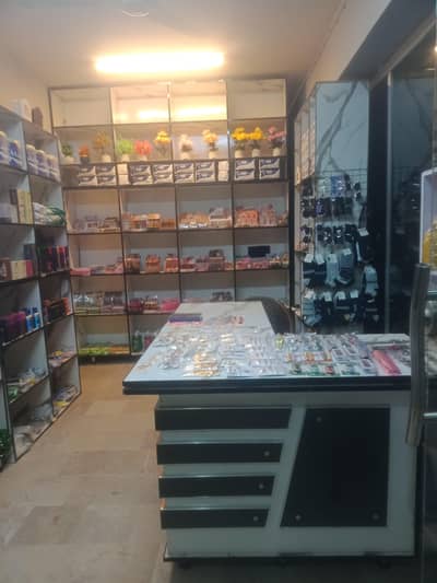 cosmetic shop and one dollar shop items for sale with wood raking