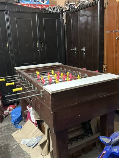 Wooden jumbo sized foosball table with ball