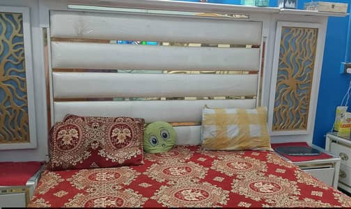Bed, Wardrobe Dressing Table, Divider.
