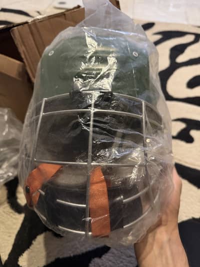 Brand new hockey helmet , good for adults,