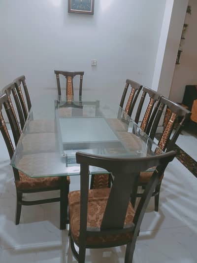 Glass Dinning table with 8 chairs