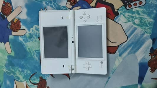Nintendo DS with three games