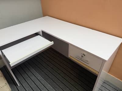 Study table with drawers and shelves