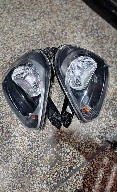 Daihatsu Mira es Head lights