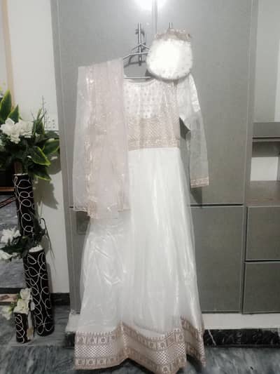 white frock with copper work