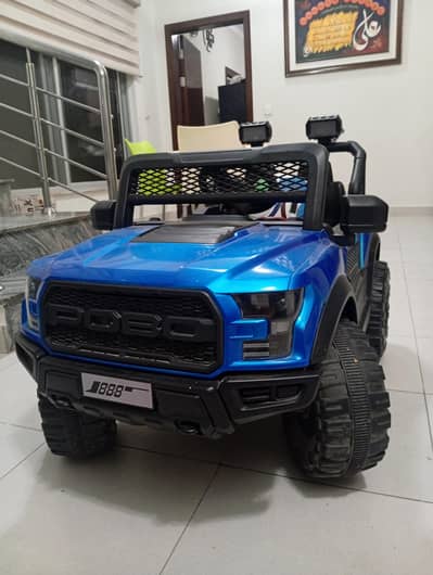 Branded four wheel GMC kids vehicle battery operated