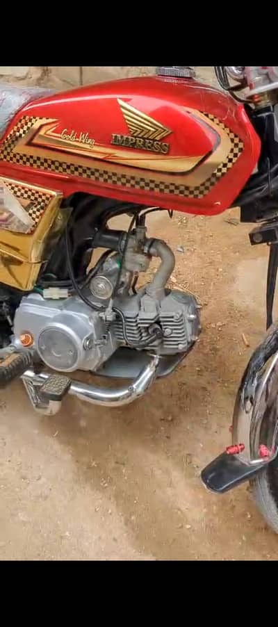 impress 70cc self start golden edition