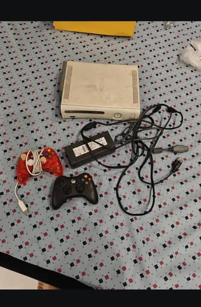 Xbox 360 with original power supply and two controllers