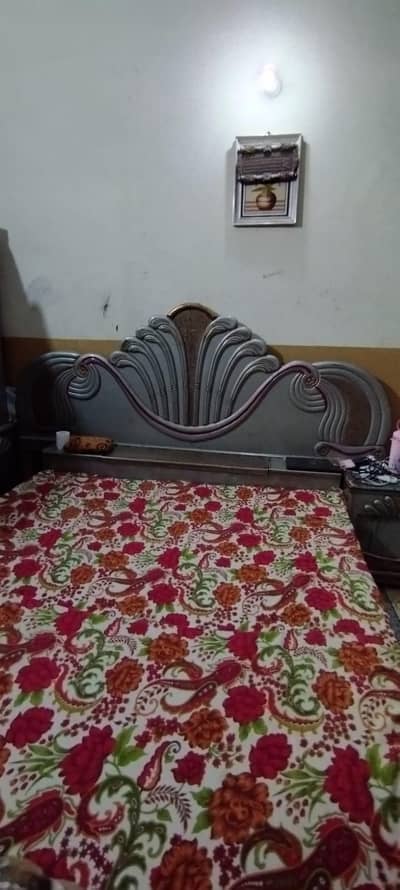 bed with side table showcase and dressing table