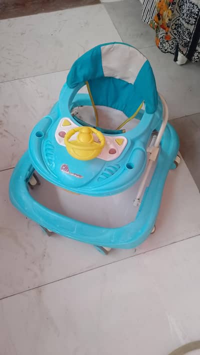 Affordable Blue Baby Walker with anti-slip safety pads