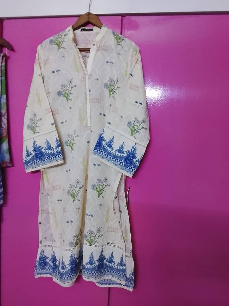 3 pc Lawn and 3 pc chiffon suit Each suit costs 3000 0